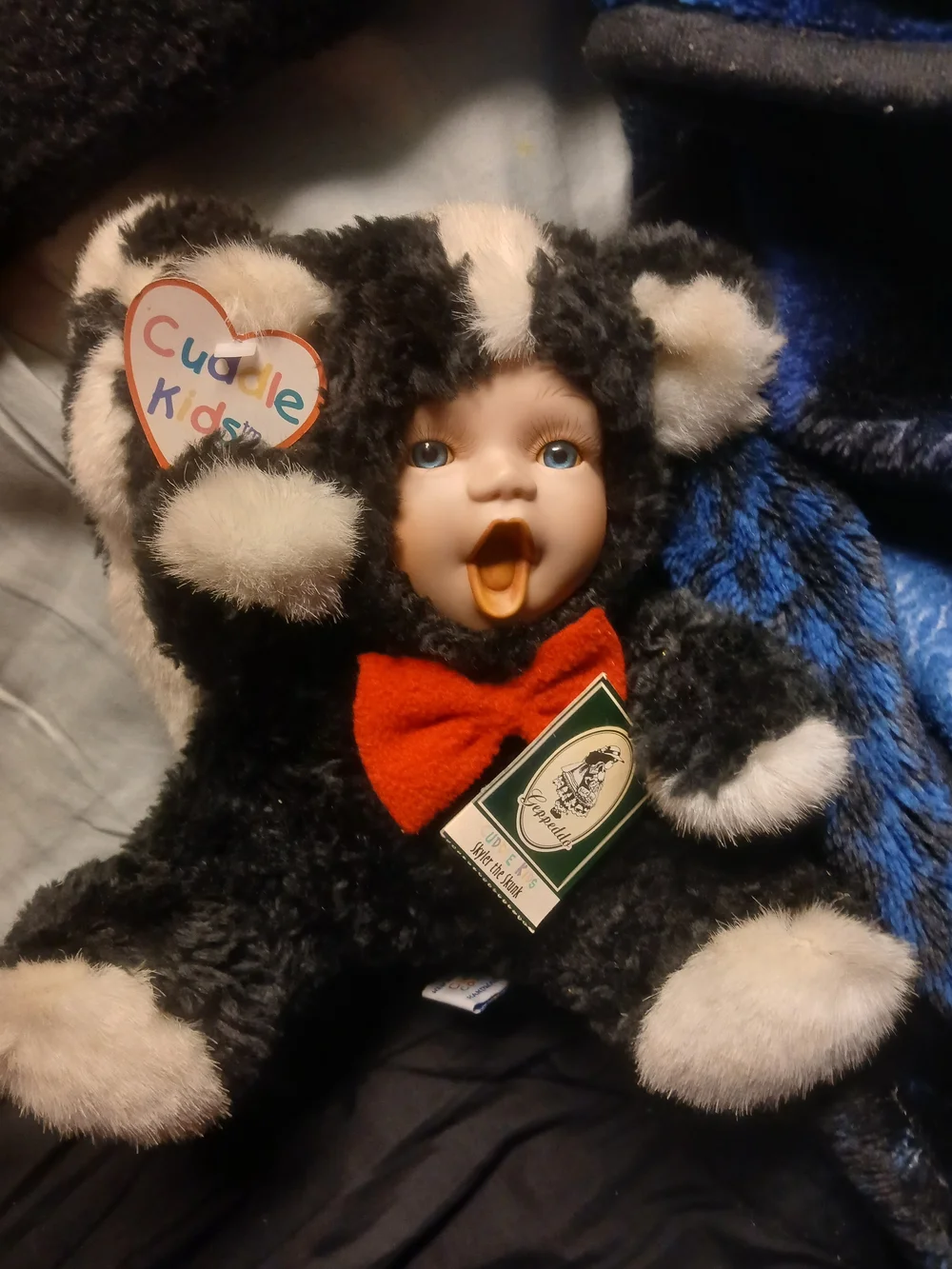 Cuddle Kids Plush Baby Doll in Black & White with Red Bow